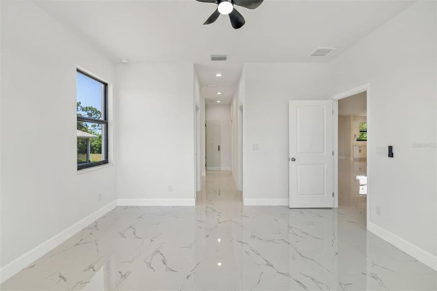 Spacious, unfurnished interior of a new home in , Port Charlotte (Image 22).