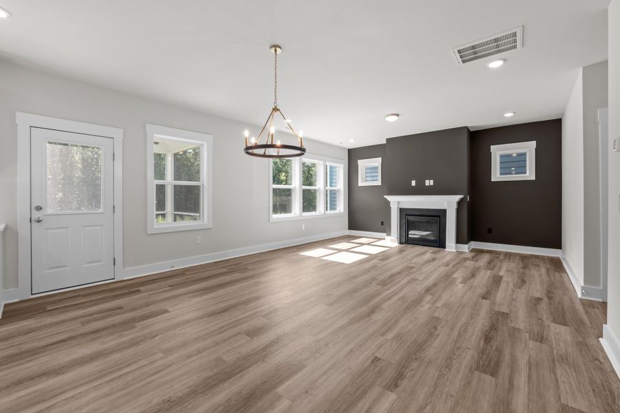 Representative unfurnished interior of a home built from the Happy by Garman Homes in Golden Gate, High Point (Image 13).