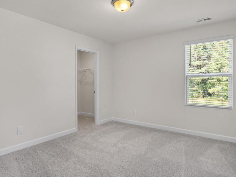 Spacious, unfurnished interior of a new home in Wellers Knoll, Lillington (Image 25).