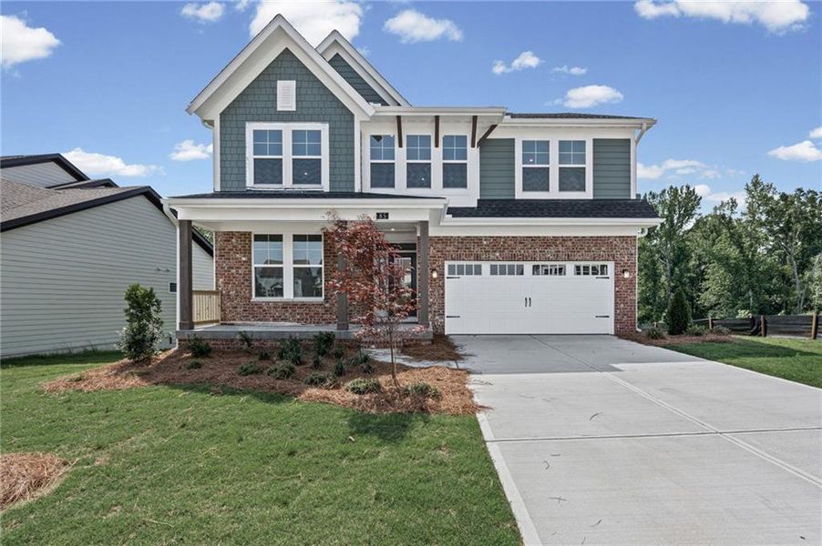 Front exterior of a new home in Twin Lakes, Hoschton, GA, highlighting curb appeal (Image 24).