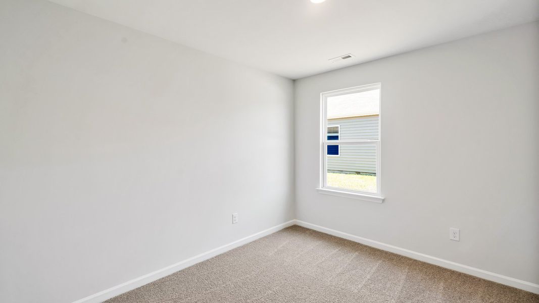 Spacious, unfurnished interior of a new home in Lockwood Landing, Supply (Image 15). Spacious, unfurnished interior of a new home in Lockwood Landing, Supply (Image 15).