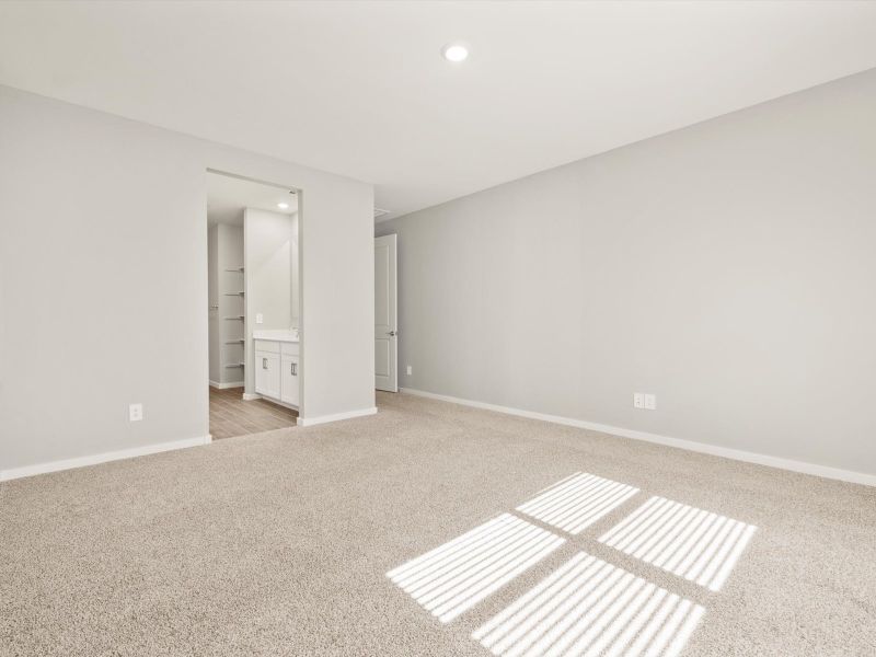 Spacious, unfurnished interior of a new home in Blossom Rock Reserve Series, Apache Junction (Image 12).