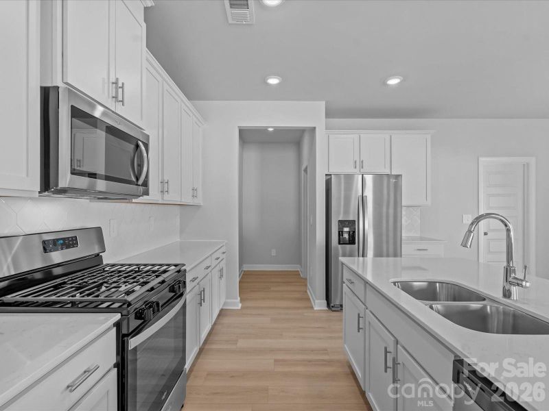 Photo is not of the actual home, but is an inspirational photo of builder’s model home and may depict options, furnishings, and/or decorator features that are not included