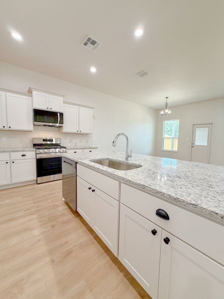 Furnished interior view inside a new home in TerraVista, Victoria (Image 10).