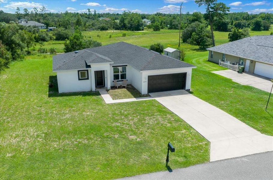 Front exterior of a new home in , Ocala, FL, highlighting curb appeal (Image 26).
