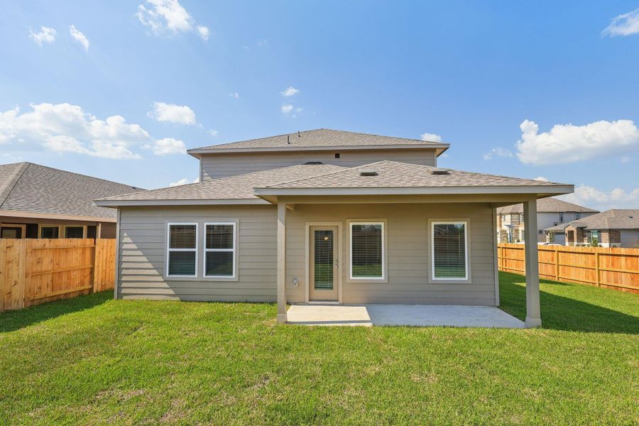 Exterior details and patio area of a home in Landing Meadows - Premier Series, New Caney (Image 3). Exterior details and patio area of a home in Landing Meadows - Premier Series, New Caney (Image 3).