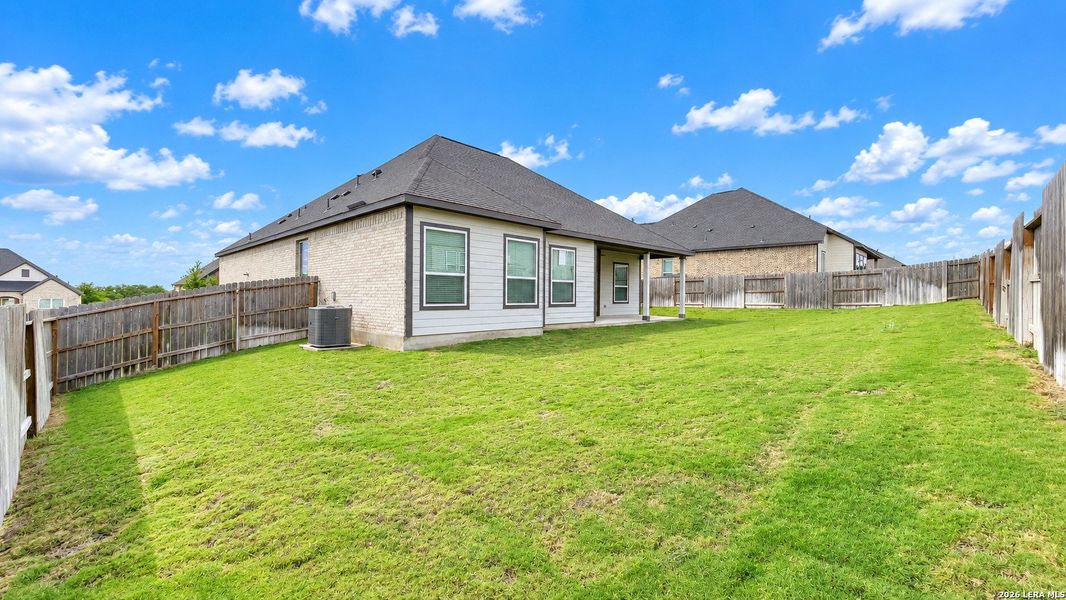 Exterior details and patio area of a home in Potranco West, Castroville (Image 21).
