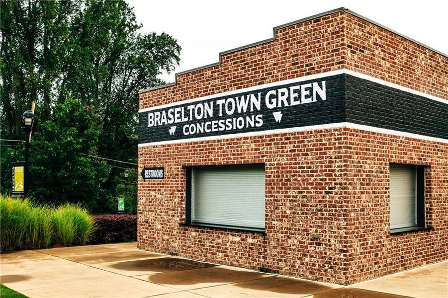 Front exterior of a new home in Rosewood Lake Estates, Hoschton, GA, highlighting curb appeal (Image 66).