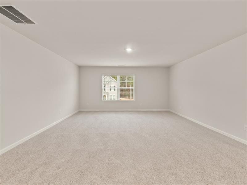 Spacious, unfurnished interior of a new home in Northwoods at Mirror Lake, Villa Rica (Image 39).