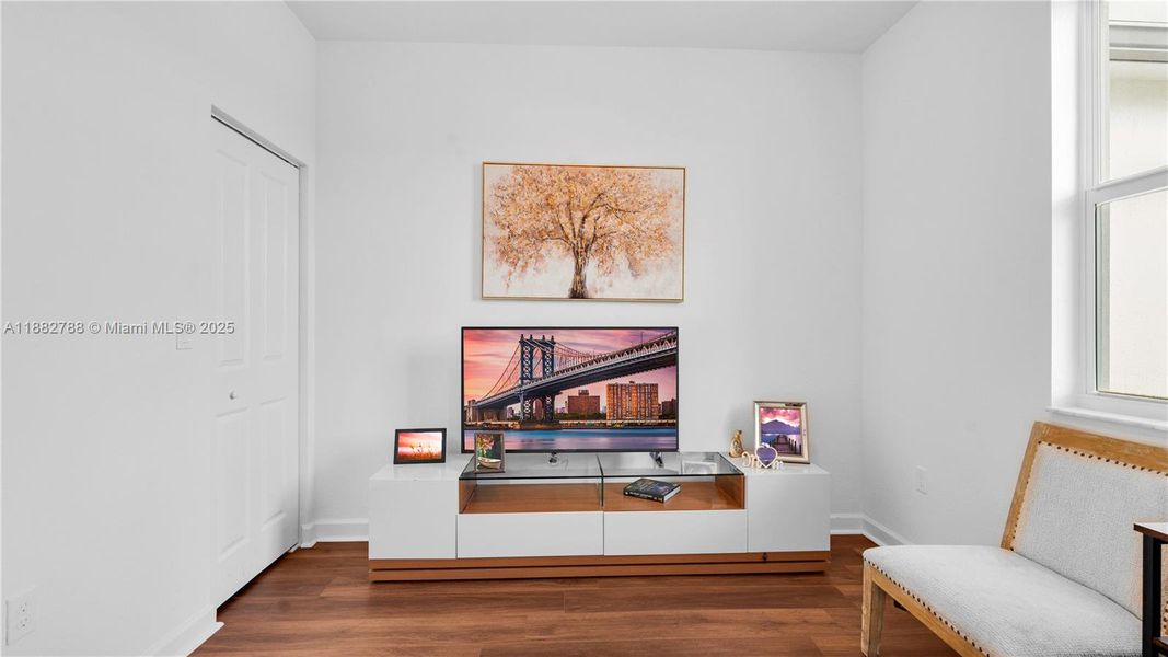 Upgraded vinyl wood flooring flows seamlessly throughout the entire upstairs, including the staircase.