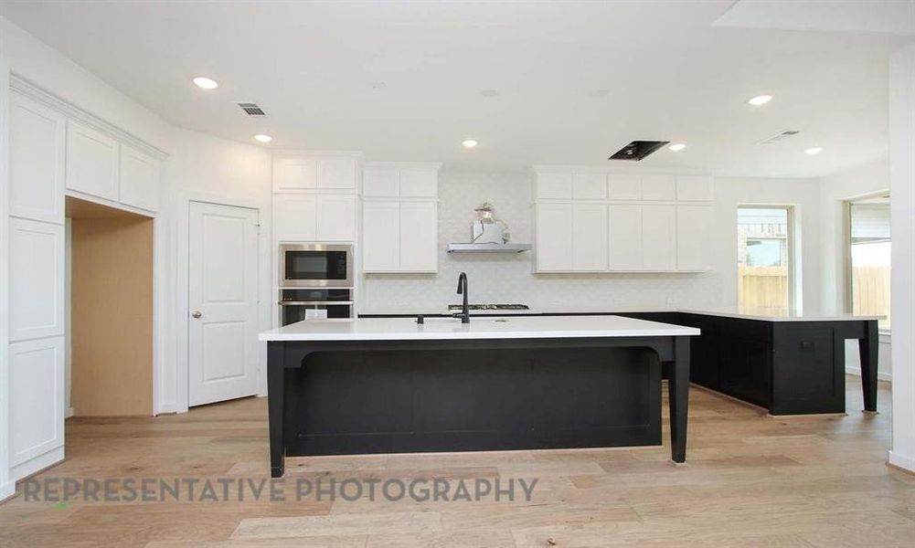 Furnished interior view inside a new home in Star Trail, Prosper (Image 12).