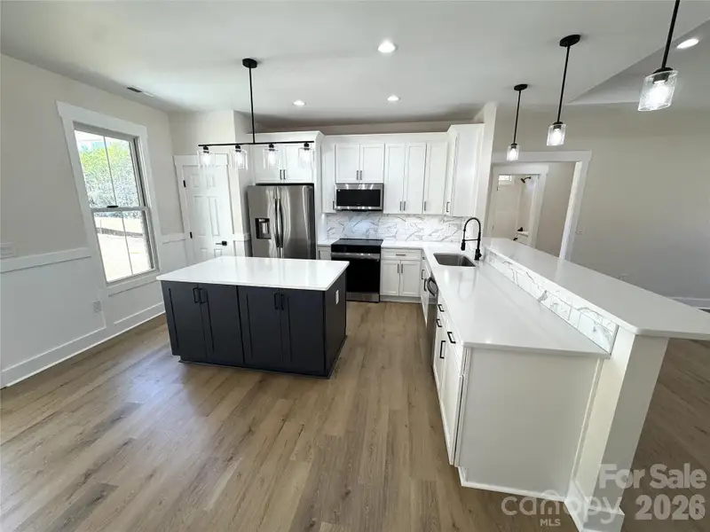 Furnished interior view inside a new home in , Albemarle (Image 7).