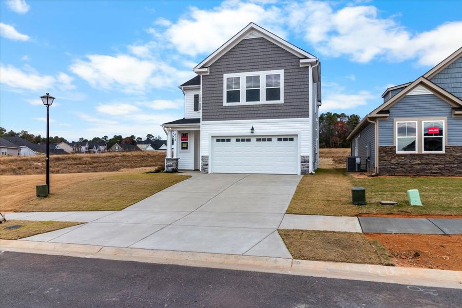 Front exterior of a new home in Windsor, North Augusta, SC, highlighting curb appeal (Image 19).