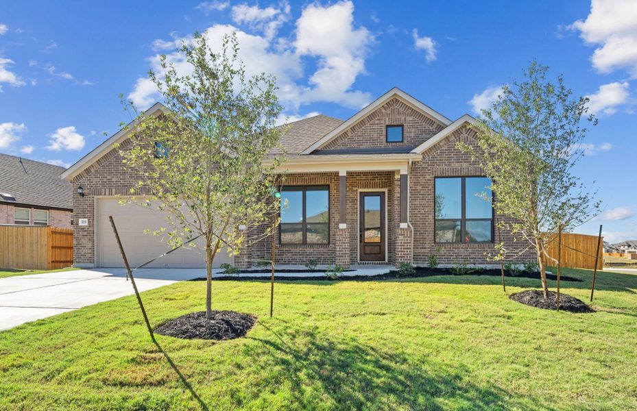 Front exterior of a new home in 6 Creeks, Kyle, TX, highlighting curb appeal (Image 2). Front exterior of a new home in 6 Creeks, Kyle, TX, highlighting curb appeal (Image 2).