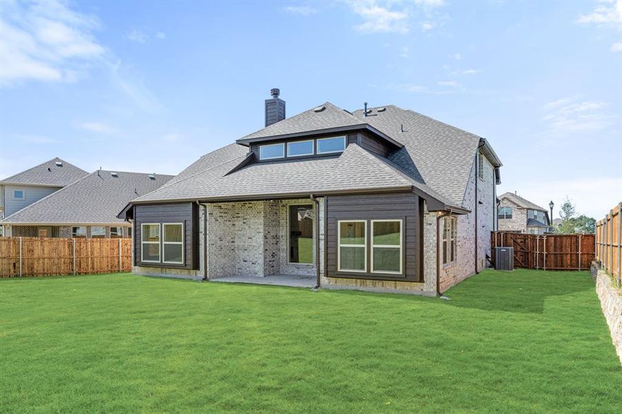 Front exterior of a new home in Willow Wood Classic 50, McKinney, TX, highlighting curb appeal (Image 26).
