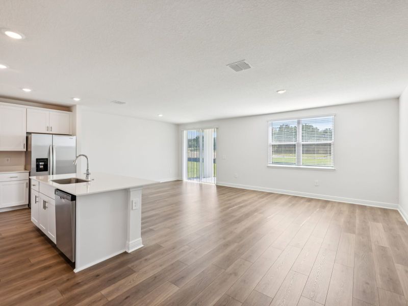 Spacious, unfurnished interior of a new home in The Reserve at Hammock Oaks - Signature Series, Lady Lake (Image 11).