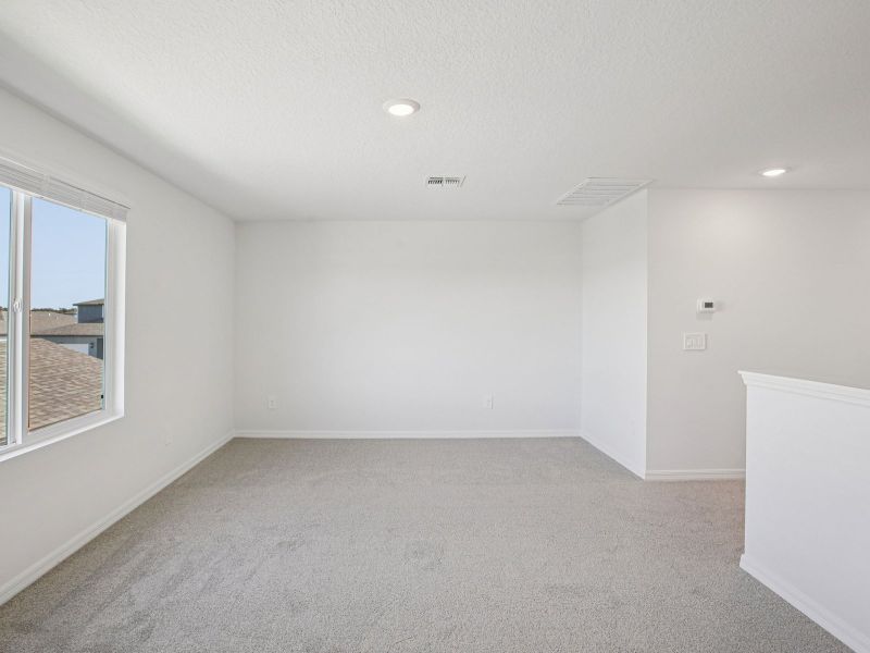 Spacious, unfurnished interior of a new home in Two Rivers - Classic Series, Zephyrhills (Image 13).