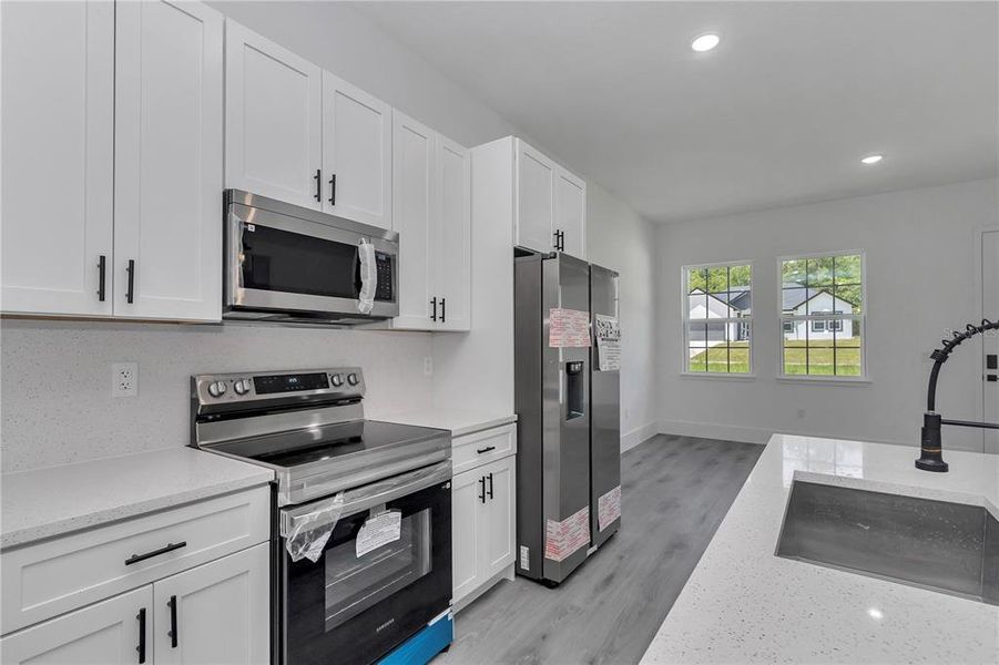 Furnished interior view inside a new home in , Dunnellon (Image 7).