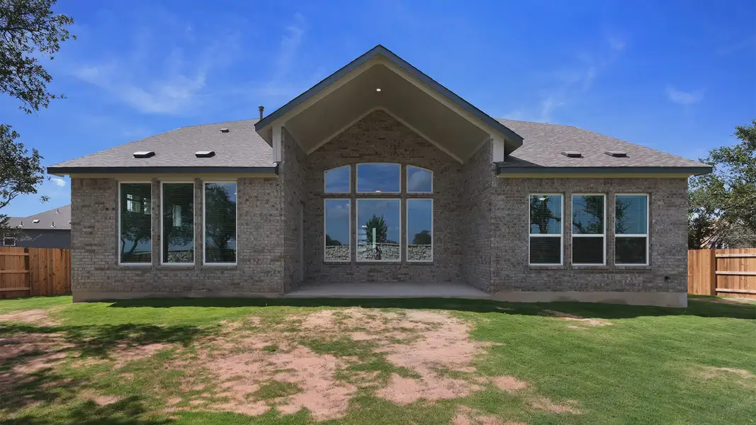 Exterior details and patio area of a home in Lariat, Liberty Hill (Image 3).