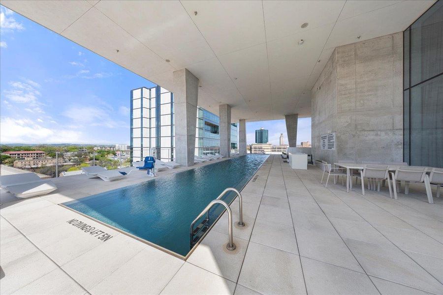 AMENITIES. Elevated amenity deck on the tenth floor includes: Covered Lap Pool, Outdoor Cooking & Dining, Fire Pit Lounge, Sauna, Hot & Cold Plunge Pool, Exercise Facility, Dog Park w/ Washing Station, Conference Room / Private Dining, Club Room w/ Kitchen. Ground floor amenities include 24/7 Concierge, Lobby and two (2) retail spaces.