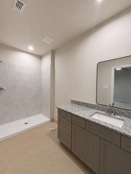 Primary suite bathroom with a Walk-In Shower Primary suite bathroom with a Walk-In Shower