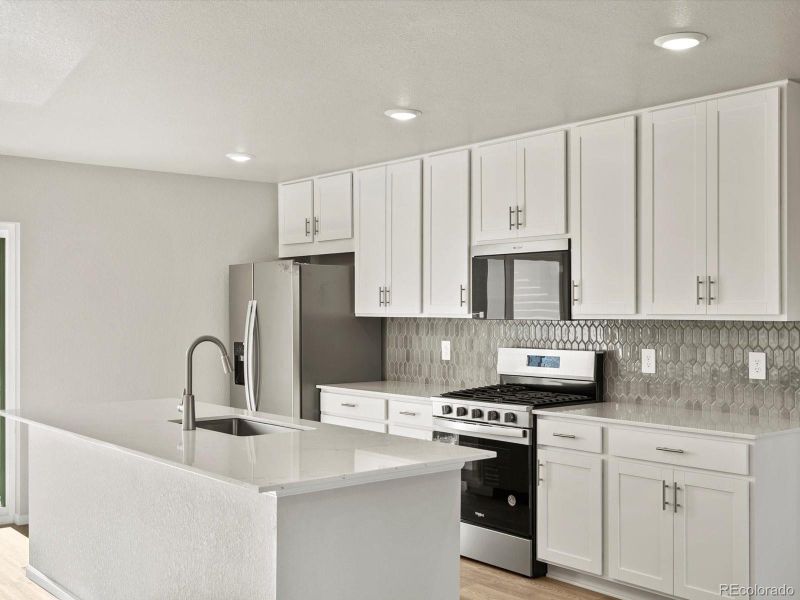 Furnished interior view inside a new home in Three Hills, Morrison (Image 7).
