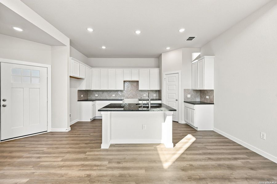 Furnished interior view inside a new home in Red Hawk Landing, San Antonio (Image 9).
