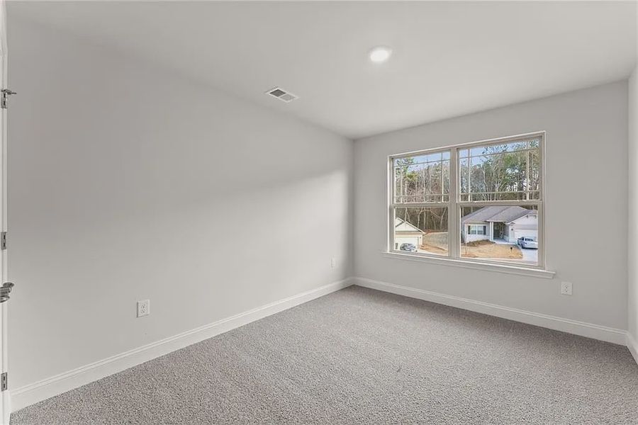 Spacious, unfurnished interior of a new home in Magnolia Villas, Cornelia (Image 31).