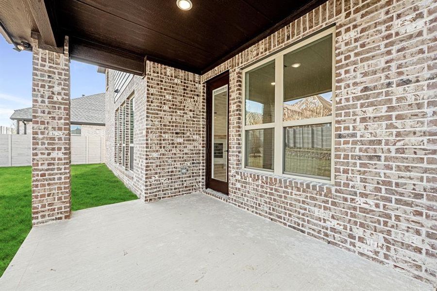 Exterior details and patio area of a home in Painted Tree, McKinney (Image 27).