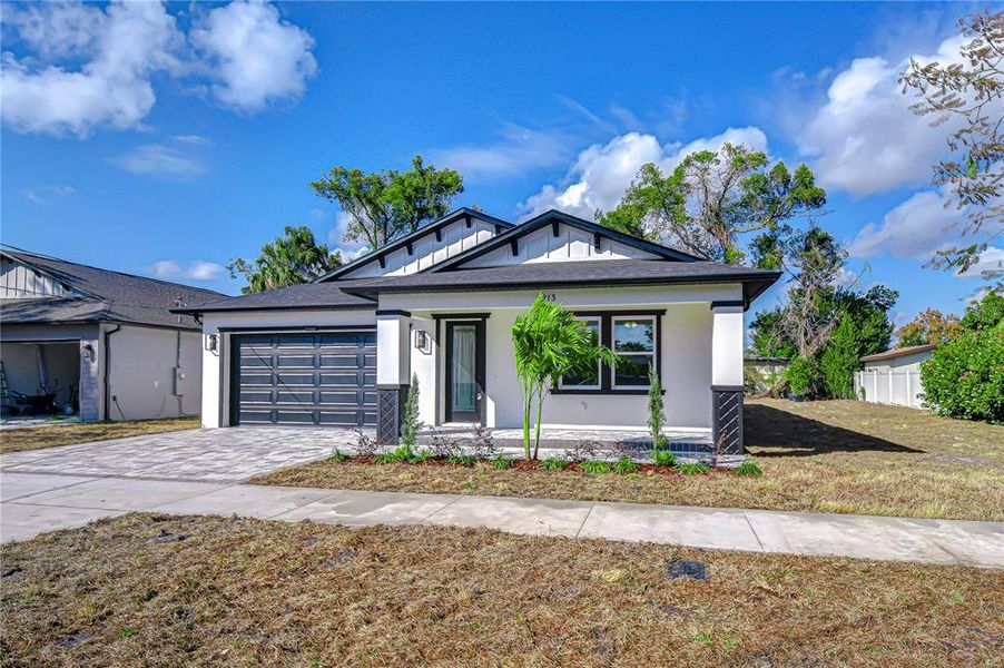 Front exterior of a new home in , Tampa, FL, highlighting curb appeal (Image 23). Front exterior of a new home in , Tampa, FL, highlighting curb appeal (Image 23).