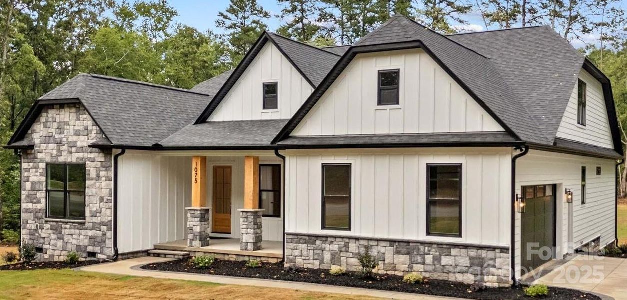 Custom 1.5 story on one acre on the Golf Course. (Be sure & watch the video.)