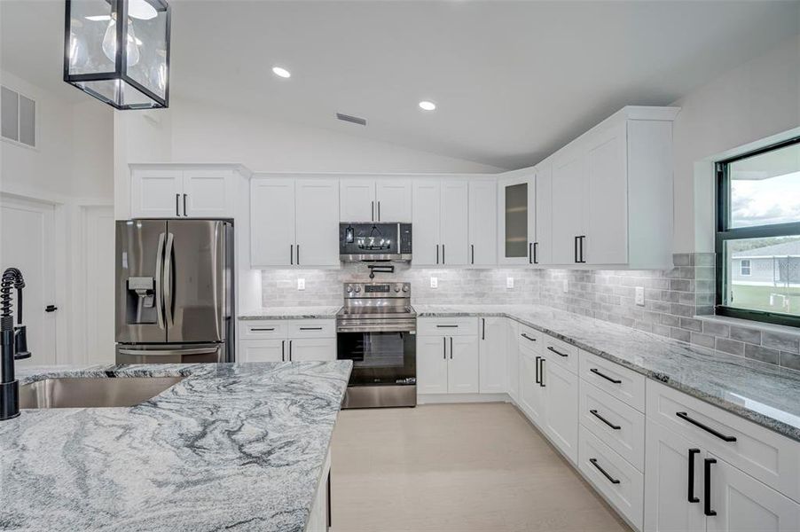 Furnished interior view inside a new home in , Port Charlotte (Image 5). Furnished interior view inside a new home in , Port Charlotte (Image 5).