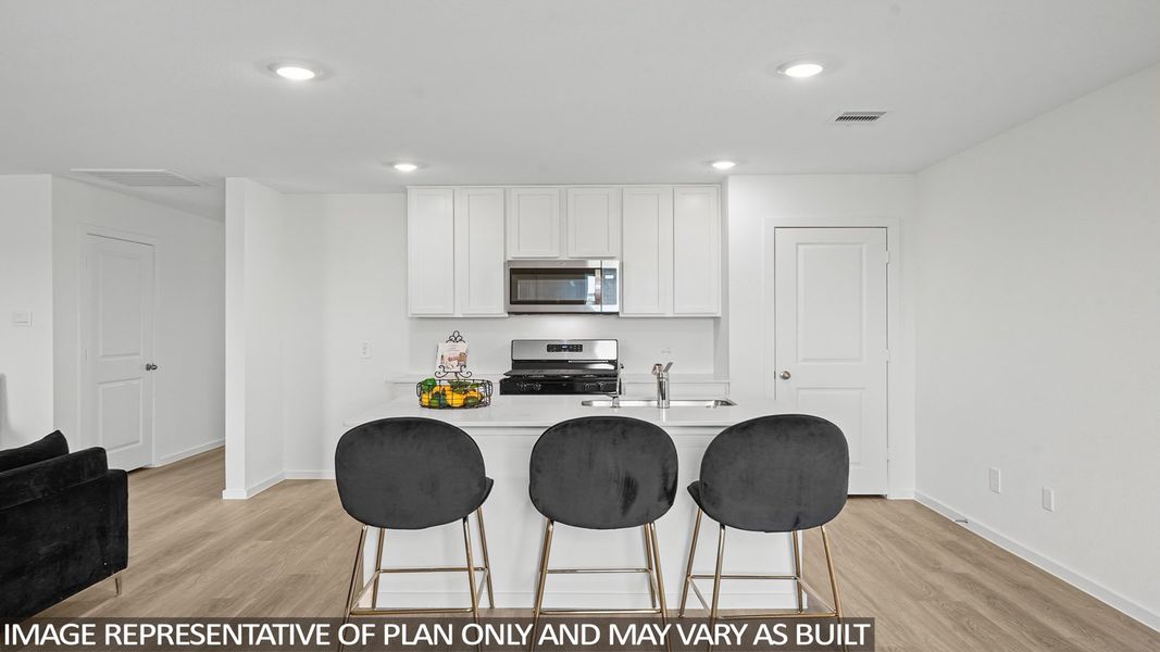 Furnished interior view inside a new home in Sunterra, Katy (Image 8).