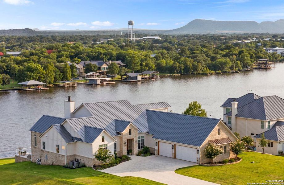 Front exterior of a new home in , Kingsland, TX, highlighting curb appeal (Image 18). Front exterior of a new home in , Kingsland, TX, highlighting curb appeal (Image 18).