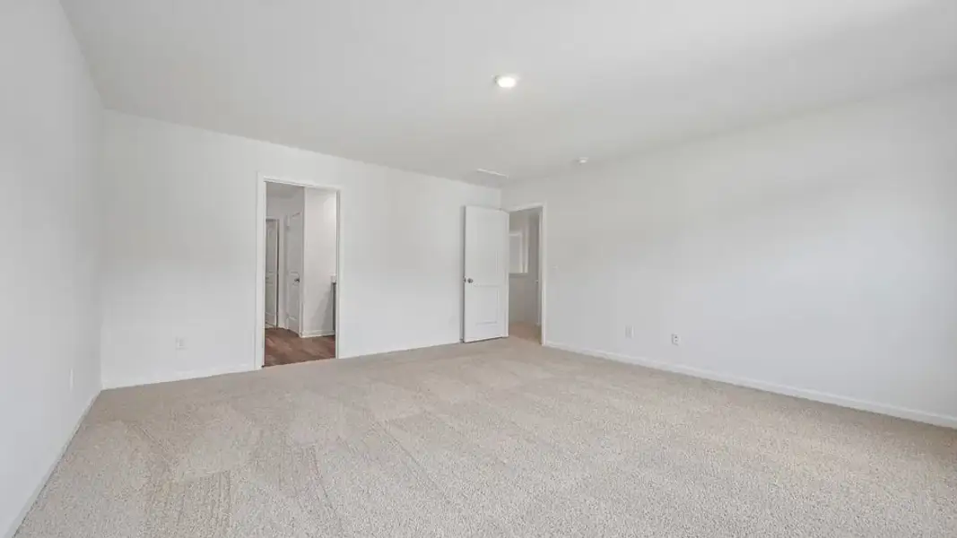 Spacious, unfurnished interior of a new home in Mangum Farms, Stem (Image 33).