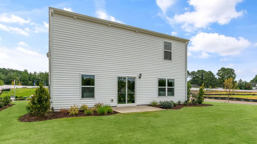 Representative exterior photo of a completed home built from the BELHAVEN by D.R. Horton in Lawson Glen, Clayton, NC (Image 23).