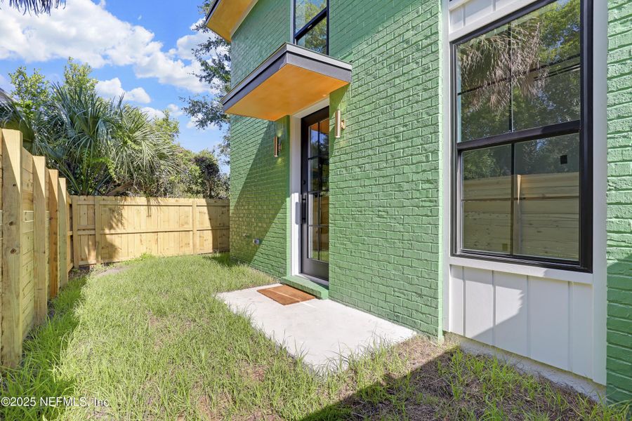 Front exterior of a new home in , Jacksonville, FL, highlighting curb appeal (Image 1).