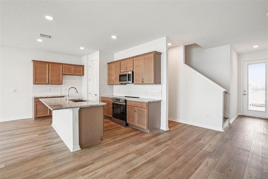 Furnished interior view inside a new home in Isla Mirada, San Antonio (Image 11).
