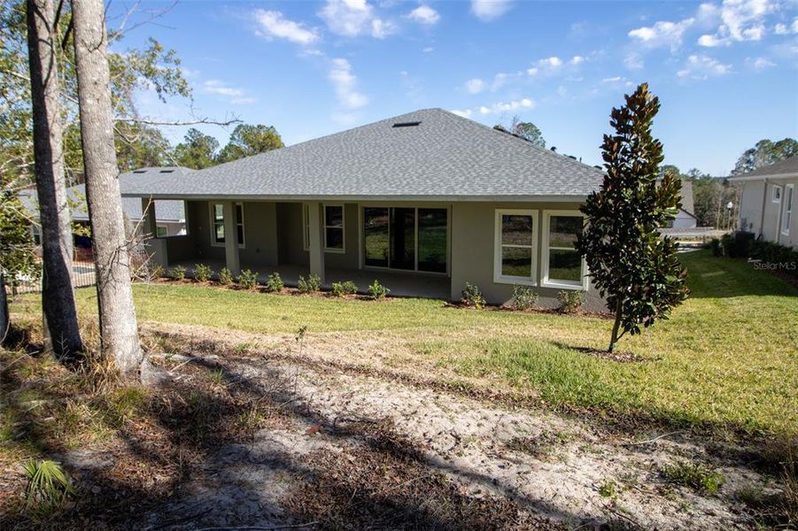 Exterior details and patio area of a home in , Brooksville (Image 29).