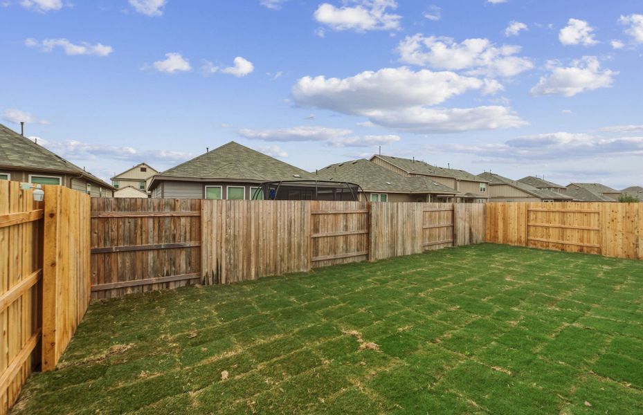 Exterior details and patio area of a home in Sunfield, Buda (Image 26).