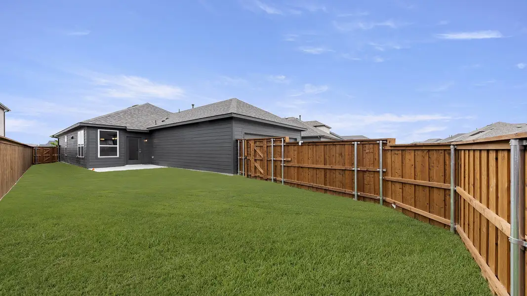 Exterior details and patio area of a home in Waterscape, Royse City (Image 4).