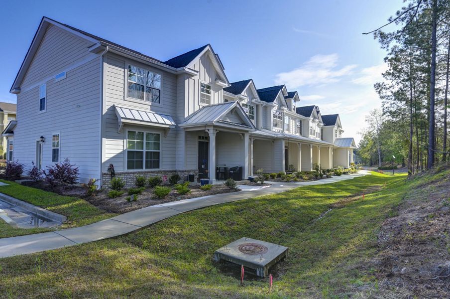 Front exterior of a new home in Lake Carolina Townhomes, Columbia, SC, highlighting curb appeal (Image 28).