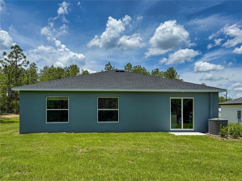 Exterior details and patio area of a home in Marion Oaks, Ocala (Image 3). Exterior details and patio area of a home in Marion Oaks, Ocala (Image 3).