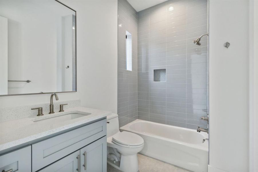 Full bathroom featuring bathtub and vanity