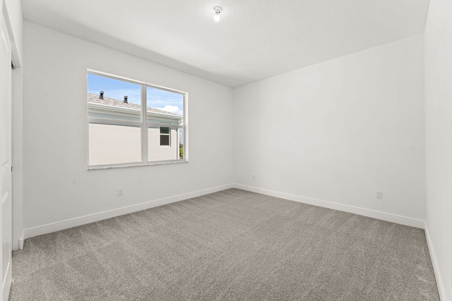 Spacious, unfurnished interior of a new home in Avila, Jensen Beach (Image 12).