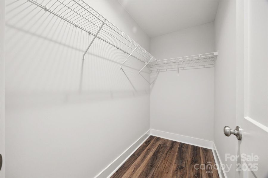Primary Bedroom Walk in closet