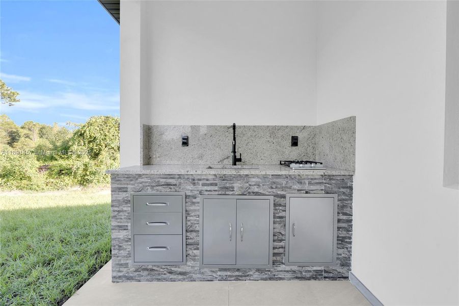 Exterior details and patio area of a home in , Lehigh Acres (Image 25). Exterior details and patio area of a home in , Lehigh Acres (Image 25).