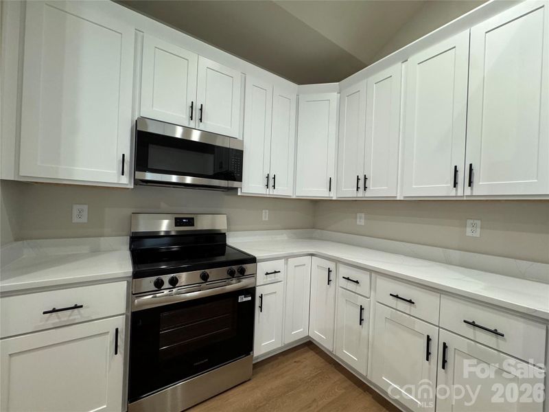Furnished interior view inside a new home in , Lenoir (Image 6).