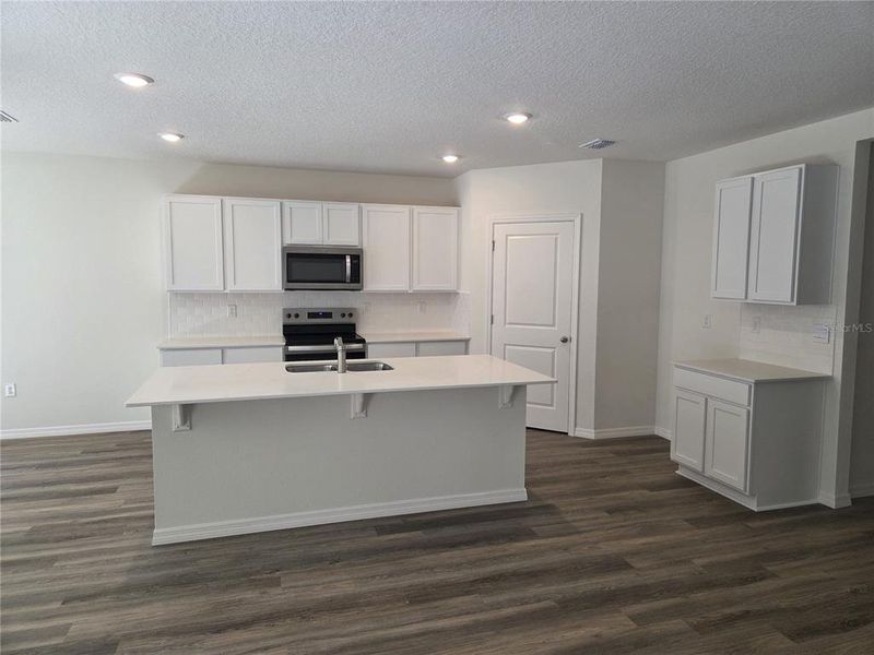 Furnished interior view inside a new home in Wexford Cove, Ormond Beach (Image 3).