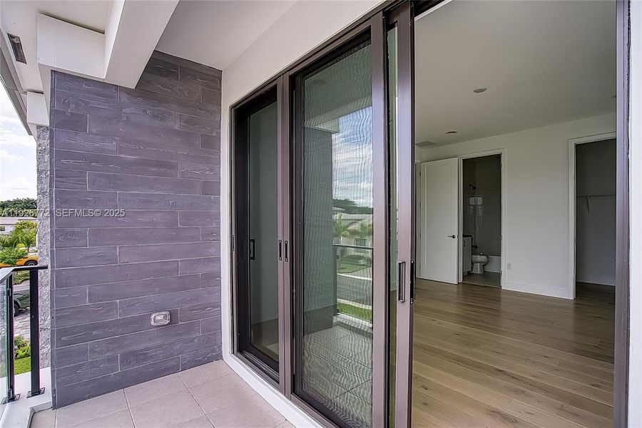 Exterior details and patio area of a home in Lotus Edge, Boca Raton (Image 34). Exterior details and patio area of a home in Lotus Edge, Boca Raton (Image 34).